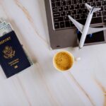 Buying tickets airplane online at booking with computer and credit card