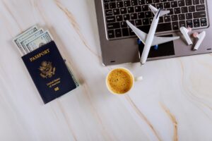 Buying tickets airplane online at booking with computer and credit card